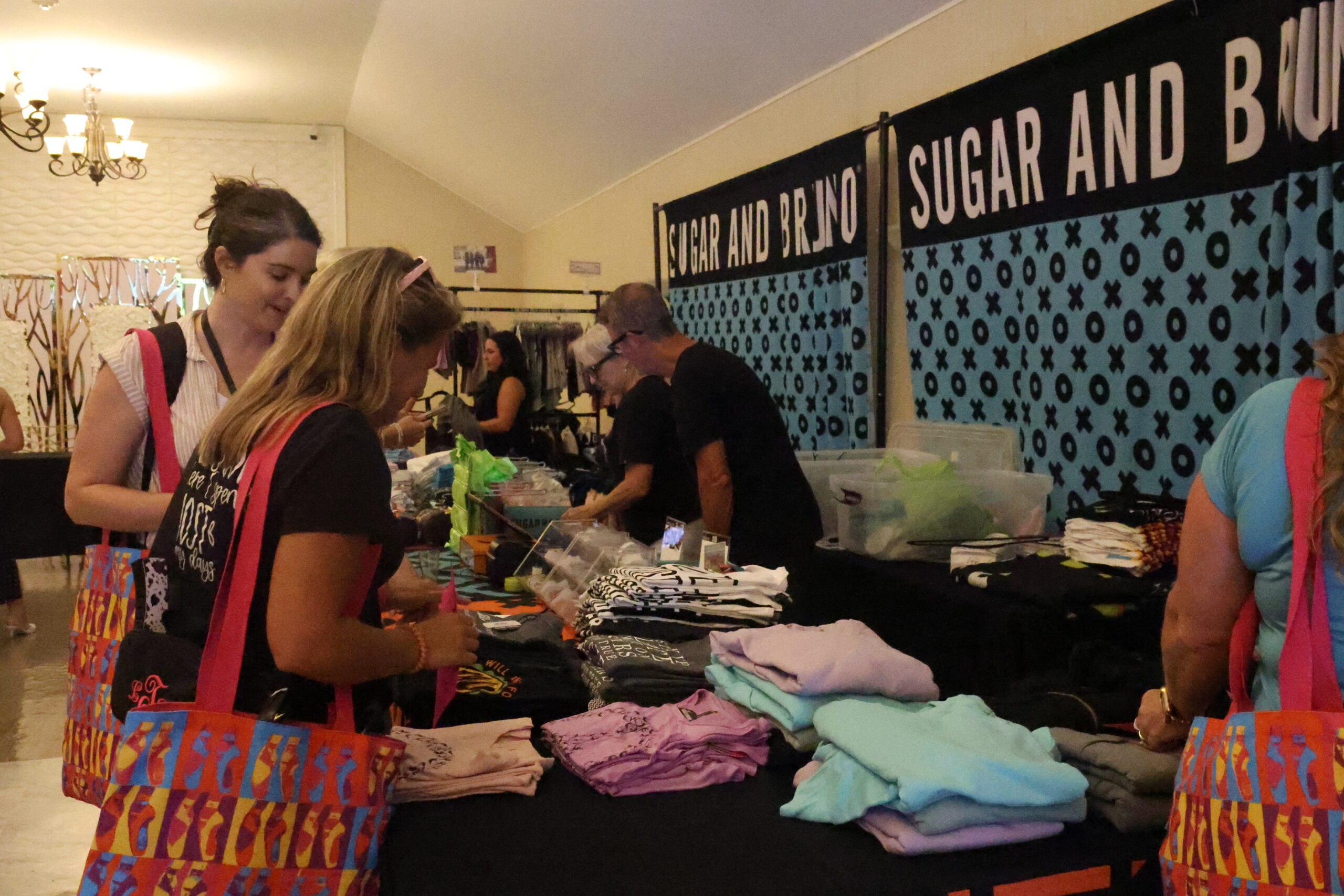 a group of people sitting and standing around each other